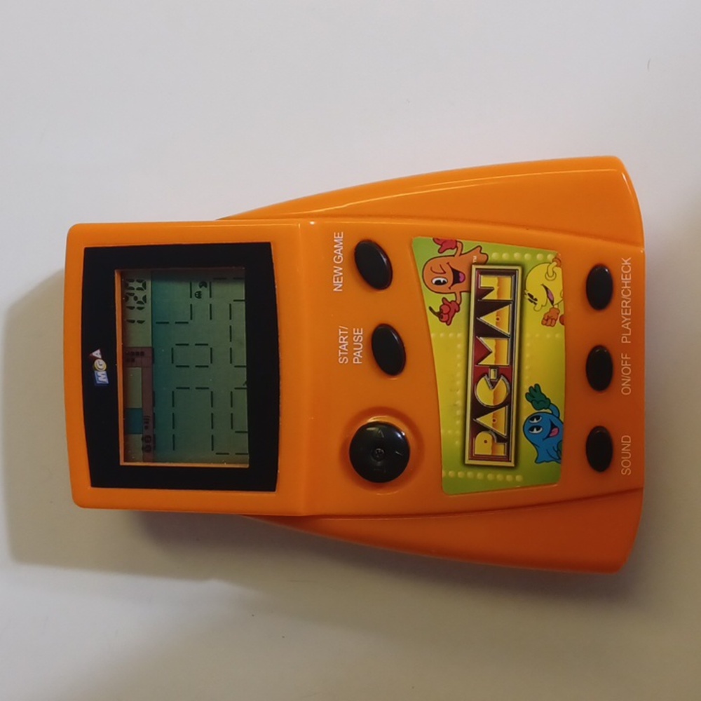 PAC-MAN handheld game by MGA